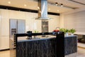 Urban apartment - Black counter in kitchen Royalty Free Stock Photo