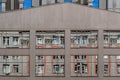 Urban architecture. Distorted reflection of one building in mirrored windows of other. Royalty Free Stock Photo