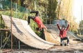 Urban athlete breakdancer performing somersault jump flip at skate park Royalty Free Stock Photo