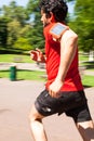 Urban athlete doing sprint in the park Royalty Free Stock Photo