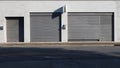 Urban background. Shop retail with metal shutters closed on the sidewalk at the side of the road