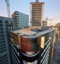 An urban background with skyscrapers\' rooftops. A 3d rendered image