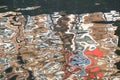 Urban background - view on the reflection of houses in the canal water