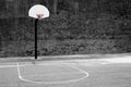 Urban basketball hoop inner city innercity wall and asphalt in o