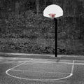 Urban basketball hoop inner city innercity wall and asphalt in outdoor park