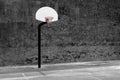 Urban Basketball Hoop Inner City Wall and Asphalt