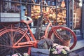 Urban bike parked to a flower shop Royalty Free Stock Photo