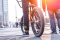 Urban biking - teenage boy riding bike in city Royalty Free Stock Photo