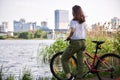 Urban biking teenage girl, bike in city