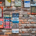 1210 Urban Brick Wall: A textured and urban background featuring an urban brick wall with weathered textures, graffiti tags, and