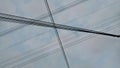 Urban Cable Wires under a cloudy clear sky Royalty Free Stock Photo