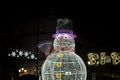 Urban christmas decoration with giant snowman made with led lights Royalty Free Stock Photo