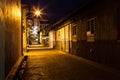 Urban city alley at night Royalty Free Stock Photo