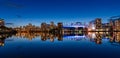 Urban city night, Vancouver marina twilight panoramic view. Skyline and buildings lights reflection Royalty Free Stock Photo