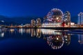 Urban city night, Vancouver marina twilight panoramic view. Skyline and buildings lights reflection Royalty Free Stock Photo