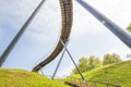 Urban city and peoples. Iron bridge on the lake. Green nature an