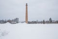 Urban city photo at Latvia, old tower. Winter, snow and building Royalty Free Stock Photo