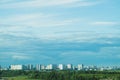 Urban cityscape panoramic view. horizon line with buildings. landscape with town and forest. city into a distance Royalty Free Stock Photo