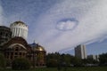 Urban clouds in the form of a round UFO