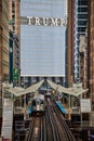 Urban Commute with Elevated Trains and Skyscraper, Chicago Perspective