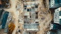 Urban construction project featuring concrete building structure in a residential area during daylight Royalty Free Stock Photo