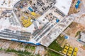 Urban construction site with crane and building. industrial construction site background. aerial view Royalty Free Stock Photo