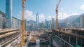 Modern City Construction Site with Cranes and High-Rise Buildings Royalty Free Stock Photo