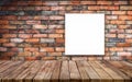 Urban Elegance: Wooden Board Empty Table Background with Brick Wall Loft and Empty Picture Frame Royalty Free Stock Photo