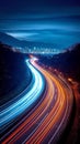 Urban energy Long exposure photo showcases car light trails at night