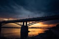Urban evening landscape. Road bridge over the Ob river at sunset. Fantastic clouds in the dark sky Royalty Free Stock Photo