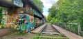 Urban exploration graffiti covered train track ruins at Seldom Seen Greenway, Pittsburgh PA