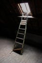 Urban exploration ladder to skylight in abandoned building Royalty Free Stock Photo