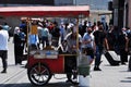 Urban fast food. Sale of roasted chestnuts and corn