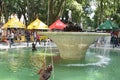 Urban fountain with water, waterworks historic building