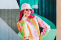 Urban Fresh street fashion look. Vanilla Girl. Kawaii vibes. Candy colors design. Bucket hat trends. Young woman with