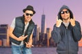 Urban Friends: Young Adults with Cool Attitude Enjoying City Skyline Royalty Free Stock Photo