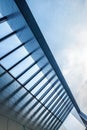 Urban Geometry, looking up to the building. Modern architecture, concrete, and glass. Abstract architectural design. Artistic Royalty Free Stock Photo