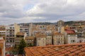 Urban Girona city skyline from a roof building on a cloudy day