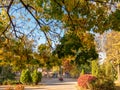 Urban golden autumn and colorful kids playground in an urban park Royalty Free Stock Photo