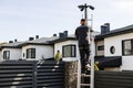 Urban Homes Safety: Installing Cameras on Metal Pole for Surveillance