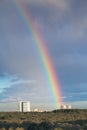 Urban house under rainbow