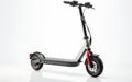 Urban Innovation Isolated Electric Scooter on White Background Royalty Free Stock Photo