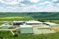 Urban landfill. Waste treatment plant depot, preparing it for separation. Royalty Free Stock Photo