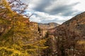 Urban landscape in autumn with large reddish trees and old stone houses. Albarracin Teruel Spain Royalty Free Stock Photo