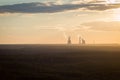 Urban landscape. Plant tracks smoking and air pollution problems in big cities.Colorful dramatic sunset in industrial Royalty Free Stock Photo