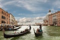 The urban landscape of Venice with the Grand Canal, with ancient buildings on its banks, the Cathedral of Santa Maria della Salute