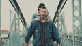 Urban Love Story. Date Boyfriend And Girlfriend On The Bridge. Royalty Free Stock Photo