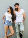 Urban loving couple. Couple stylish young modern people. Couple white shirts lean each other. Hipster bearded and Royalty Free Stock Photo