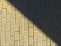 Urban modern yellow pavement tiles on the sunlight Royalty Free Stock Photo