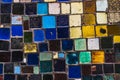 Urban mosaic background with colorful handmade tiles Royalty Free Stock Photo